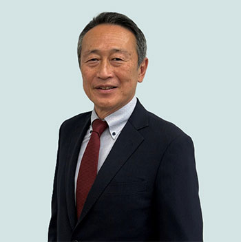 写真：保安通信協会理事長 小山　雅博